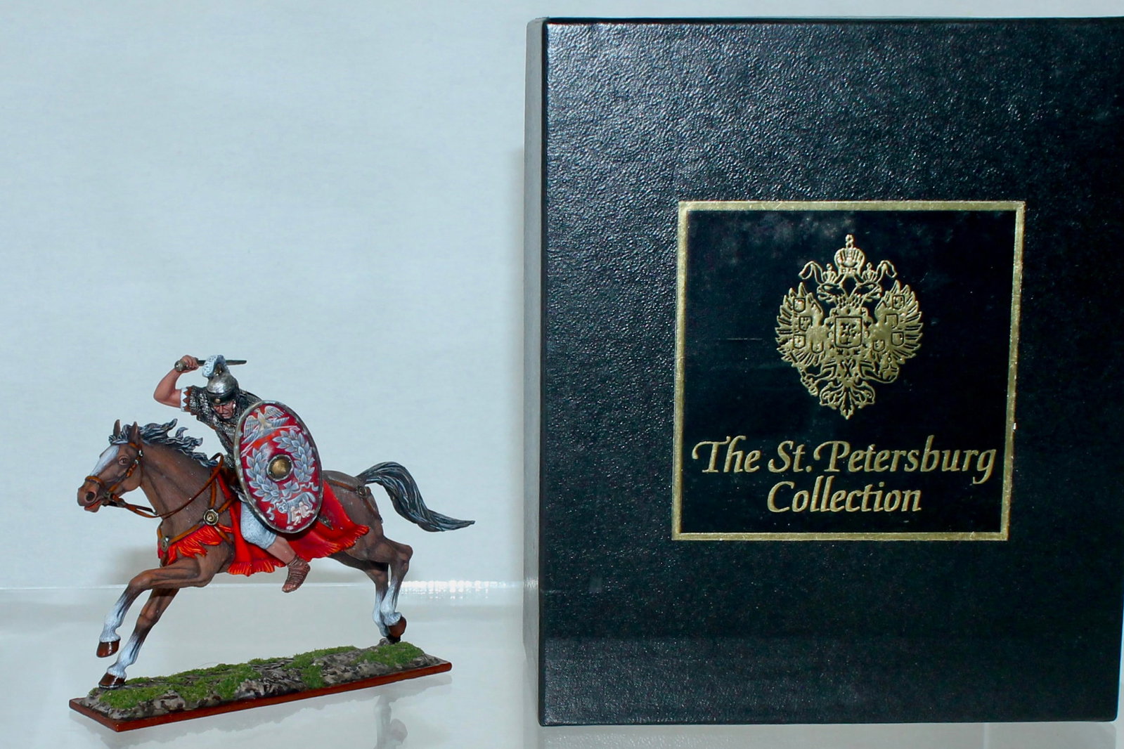 Aero Art Roman Auxillary Cavalry Decurion: St. Petersburg Collection. 3774.3 on Underside of Base. 1 Piece. Slight Oxidation to Paint on Horse. Condition Very Good to Excellent. Box Very Good.