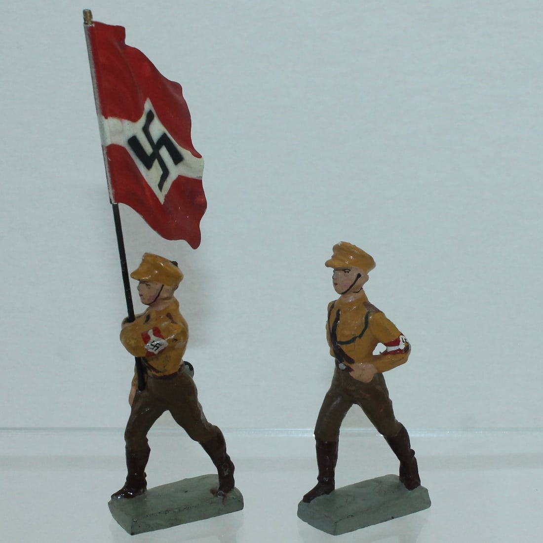 Lineol Lot Hitler Youth Marching with Flag: Lot includes 9/337 Marching and 9/330 Marching with Flag. Made 1933-36. 2 Pieces. Condition Excellent. No Box.