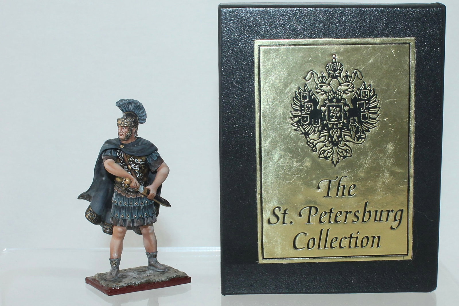 Aero Art Titus Drawing Sword: St. Petersburg Collection. Prefect of the Praetorian Guard. 6319 on Underside of Base. 1 Piece. Condition Very Good. Slight Areas of Paint Discoloration, Mostly to Cape. Box Very Good.