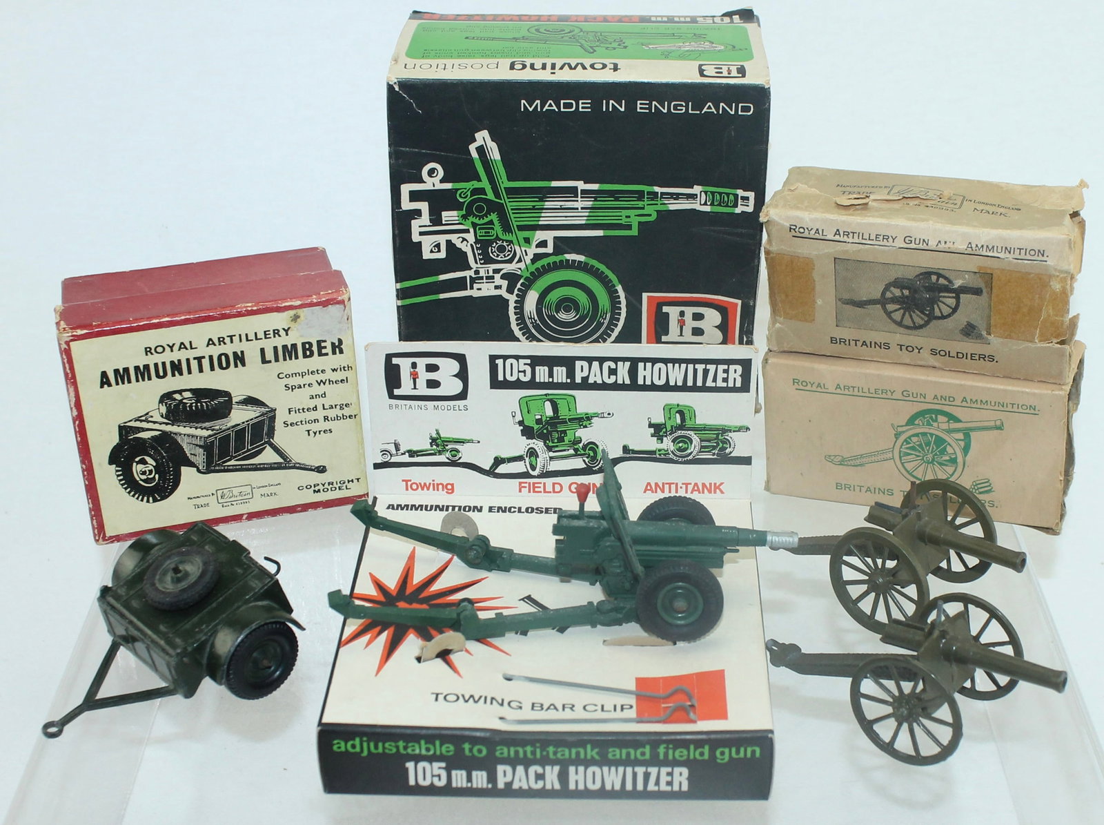 Britains Lot Howitzer Artillery Gun Limber: Lot includes 9724 105mm Pack Howitzer, 2 of 1263 Royal Artillery Gun and Ammo and 1726 Ammunition Limber. 4 Pieces. Condition Very Good to Excellent. Boxes Fair to Good. One 1263 Box Tattered.