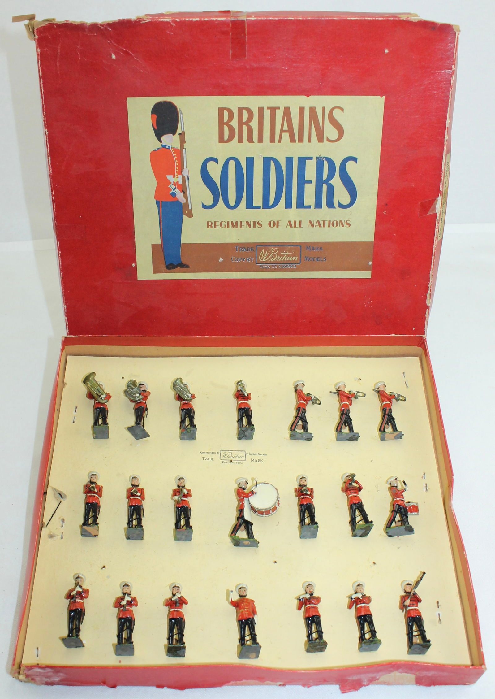 Britains Set 2014 U.S. Marine Band: With Metal Drums. Made 1948-55. Retied in Box. 21 Pieces. Condition Very Good to Excellent. Drum Major Short Mace Broken. Slight paint Wear on Some Figures. Box Fair to Good. Side Panel Distressed. Ol