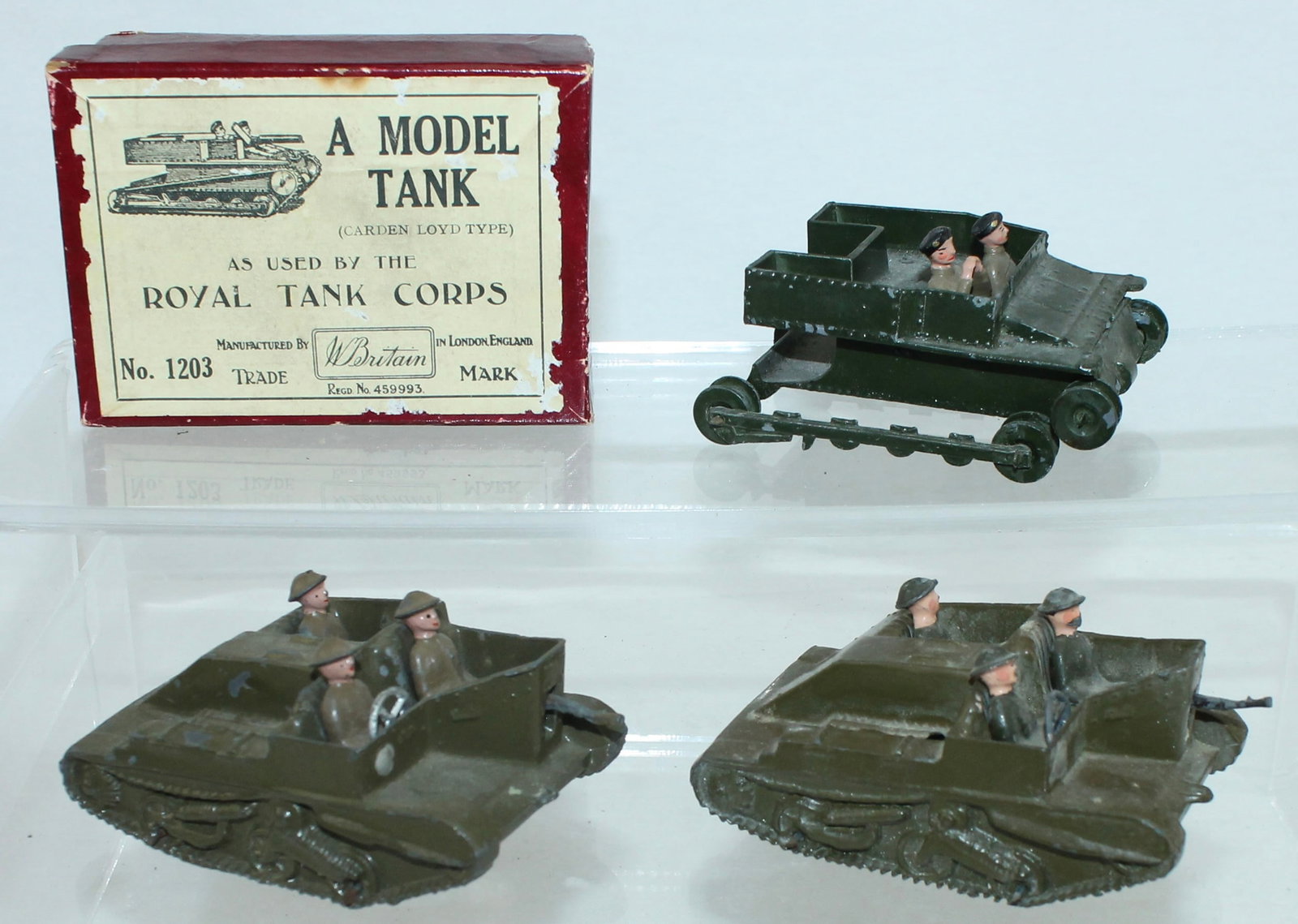 Britains Lot of Small Tanks: Lot includes 1203 Tank of the Royal Tank Corps and 2 of 1876 Bren Gun Carrier with Crew. 11 Pieces. Condition Good. Royal Tank Missing Machine Gunner and Treads. Box Good.