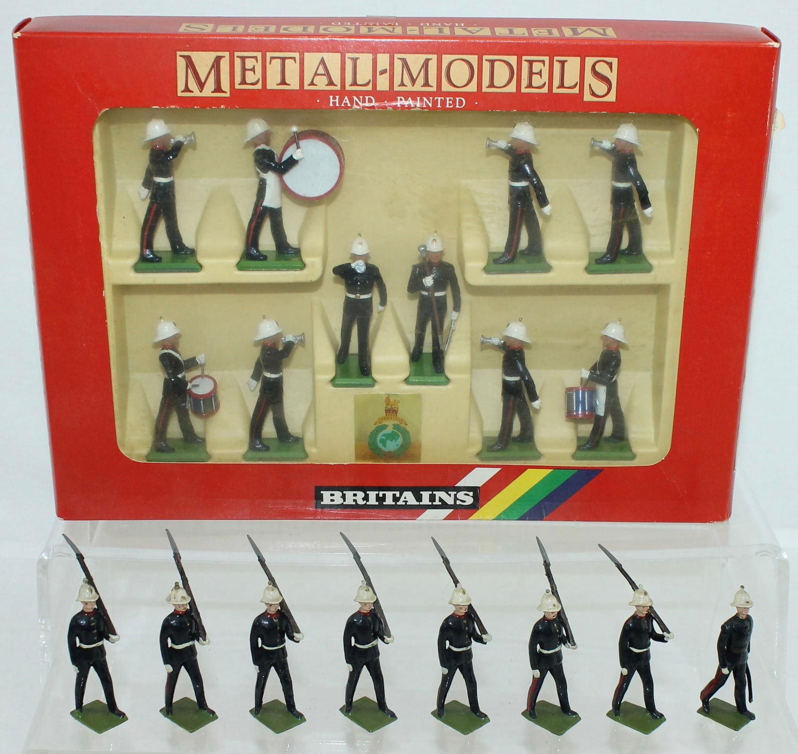 Britains Lot Royal Marines Infantry Color Guard: Lot includes Set 7204 Royal Marine Drums and Bugles, Mint in Box and 8 Troopers From Set 35 Royal Marines Marching at the Slope. 18 Pieces. Condition Very Good to Mint. Box Very Good. Cello Intact.