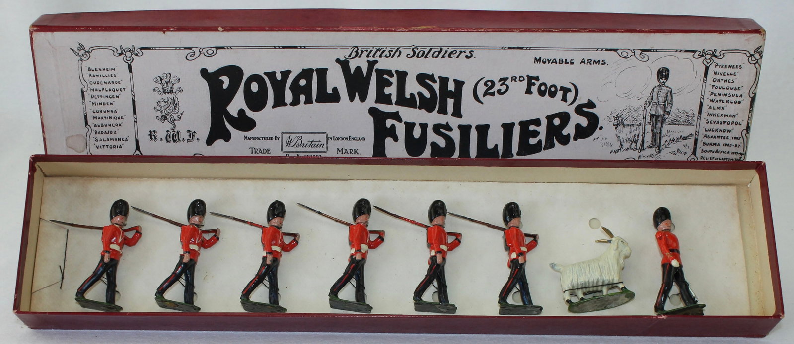 Britains Set 74 Royal Welsh Fusiliers: With Mascot. Pre War. Retied on Non-Original Tie Card. 8 Pieces. Condition Excellent. Box. Very Good.
