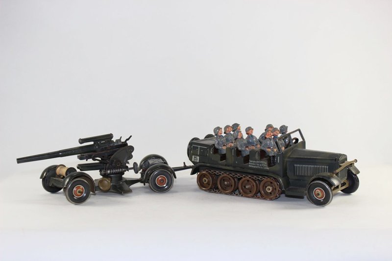 Tippco Tinplate prime mover: Tippco Tinplate prime mover with full compliment of Wehrmacht towing Mobile anti- aircraft gun All original excellent condition 11 pieces