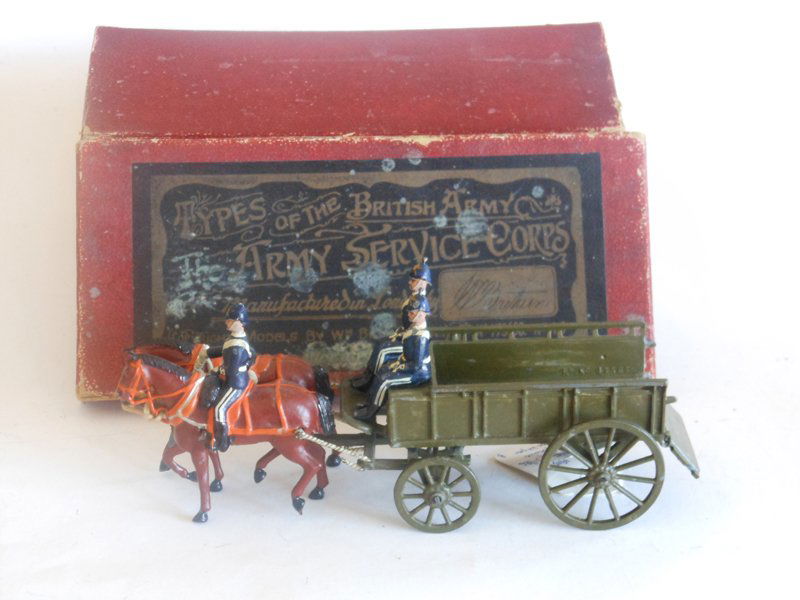 Britains Set # 146 Royal Army Service Corps: Britains Set # 146 Royal Army Service Corps Wagon Collar Harness with Original Box Pre War 5 Pieces. Condition Good (One Helmet Ball Gone.) Box Fair (Mildew on Lid)
