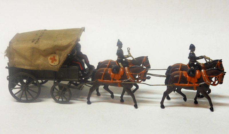 Britains Set # 145 Royal Army Medical Corps Wagon: Britains Set # 145 Royal Army Medical Corps Wagon Collar Harness Version. Pre War. 7 Pieces Unboxed. Condition Very Good (missing one helmet spike).