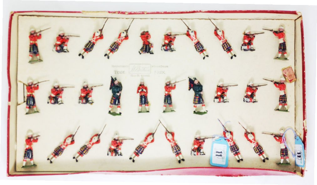 Britains Set #89 Cameron Highlanders Firing: Tied in original box. Rare legs-together version. Circa 1908. 30 Pieces. Condition: Figures- Very Good: Box- Good with multiple edge splits.