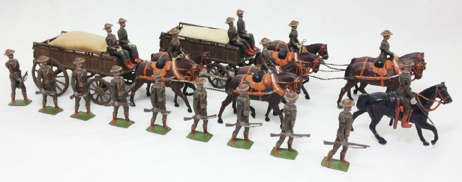 Britains Boer Supply Wagon Column: Extremely rare and desirable Boer War Supply Column complete with two wagons, Officer on mounted horse with drawn sword and 9 troopers marching at the carry. 20 Pieces. Circa 1907. Condition: Excellen