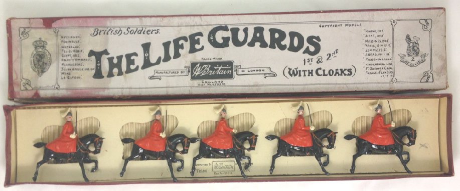 Britains Set #400 The Lifeguards in Summer: The Lifeguards in Summer Cloaks in original Fred Whisstock box with slotted tie card. Pre War.5 Pieces. Condition: Figures- Excellent, Box-Very Good, withwater stains and edge splits and tears.