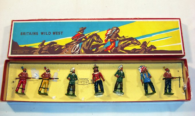 Britains: Set #150 North American Indians: Indians on Foot. 7 re-tied in original box. Post war. (M, Box G) [7]. Tie card damaged.