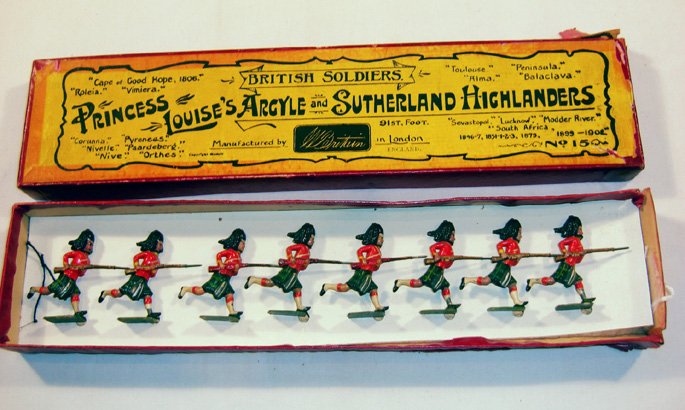 Britains: Pre-War Set #11 Blackwatch: 8 charging fixed rifles in Britain’s box #15 Argyle and Sutherland Highlanders #11. Tied in on mismatched replacement card. (NM, box P) [8].