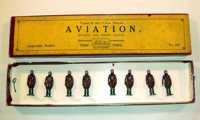 Britains: Rare Set 332 U.S.A., Aviation: 8 in short brown coats, in original “Types box” (VG, age wear, box G.) [8]. Tied on replacement card.