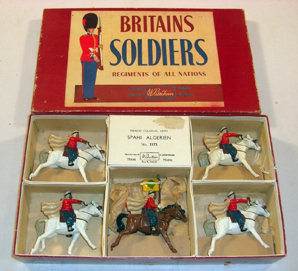 Britains: Set # 2172 French Colonial Army: Spahi Algerian, 4 mounted on white horses and 1 flag bearer in original “Regiments” box, (NM, Box G) [5].