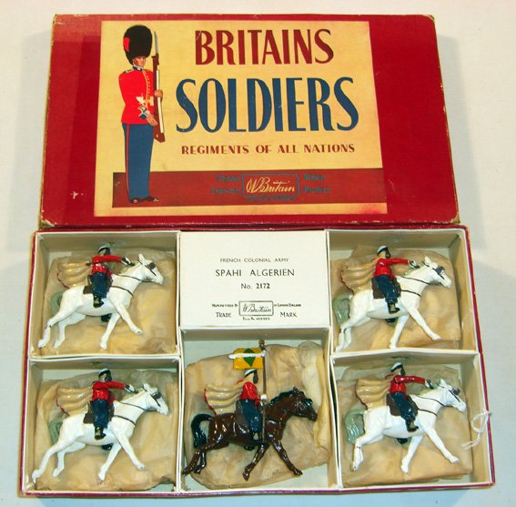 Britains: Set # 2172 French Colonial Army: Spahi Algerian 4 mounted on white horses and 1 flag bearer in original “Regiments” box, (VG, missing all rifle butts, Box G) [5].