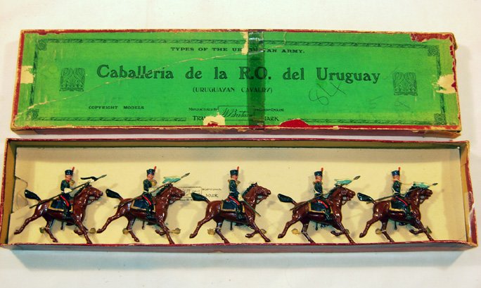 Britains: Rare Set # 220 Uruguayan Cavalry: Trotting with officer, in original “Flowers” box (E+, box P) [5]. Mismatched - possible pennant repaint.