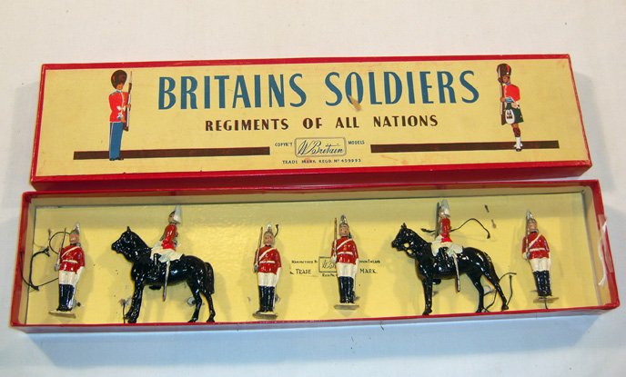 Britains: Set # 2029 The Life Guards: Mounted and Foot. Post War Set in “Regiments” box, loose, 4 dismounted, 2 mounted at the halt with swords in original “Regiments” box (NM, box E) (6).
