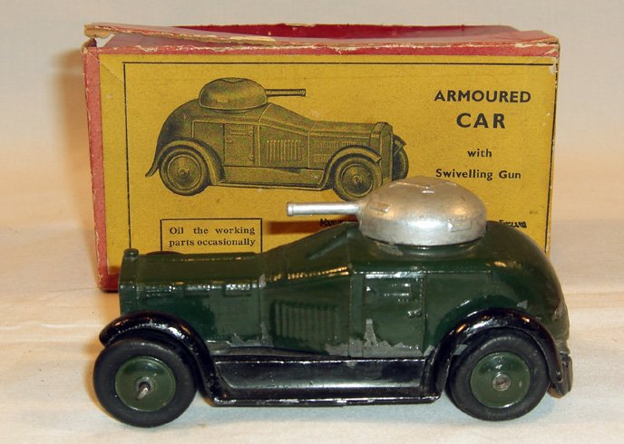 Britains: Set # 1321 Armoured Car: With Swiveling Gun, in original box, black wheels, (E+, few chips, 3 tires slightly flat, box F) (1).