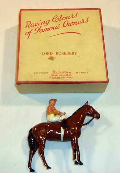 Britains: Racing Colours of Famous Owners: Lord Rosebery, yellow with pink stripe silk RC 6 Horse and Jockey in original box (NM, few chips. Box G) (2). Whip broken.