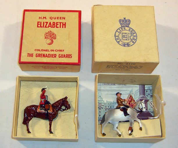 Britains Lot: Set # 2170 The Life Guards: Mounted trumpeter of the Band of the Life Guards in full ceremonial dress in original box (NM, Box VG) [1] W/454Britains: Set # 2065 H.M. Queen Elizabeth Colonel in Chief mounted at the salute in orig