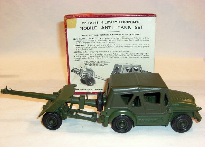 Britains: Set # 2174 Mobile Anti- Tank Set: Comprising 120 MM battalion anti-tank gun drawn by an Austin Champ in original box (NM, Box G) (2).