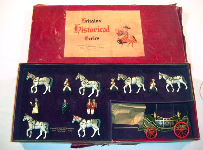 Britains: Set #2094 State Open Landau: (1954-1957) With team of six Windsor Greys, and H.M. The Queen and H.R.H. The Duke of Edinburgh tied in original box (NM, Box F) (9). Label missing.