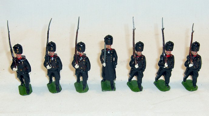 Britains: Set #2019 6 Danish Guards w/1 officer: 6 Guards marching at the slope, with officer, Post-War set, officer on square base, (NM, few chips) [7].