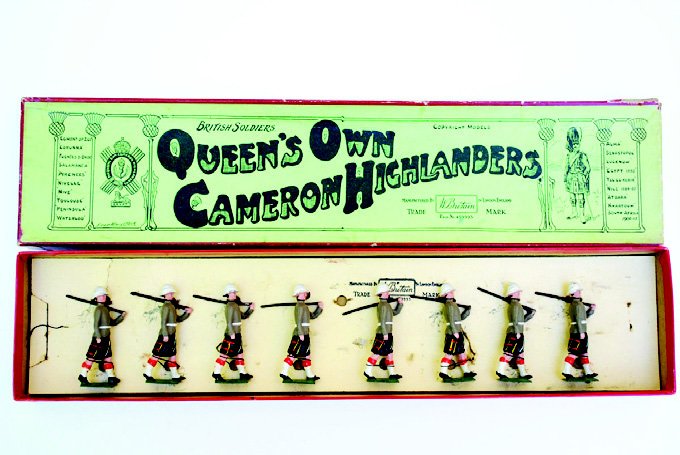 Britains Set #114 Cameron Highlanders: Pre-War with Original Box. 8 Pieces. Condition Very Good, Box Good (split on one corner of lid).