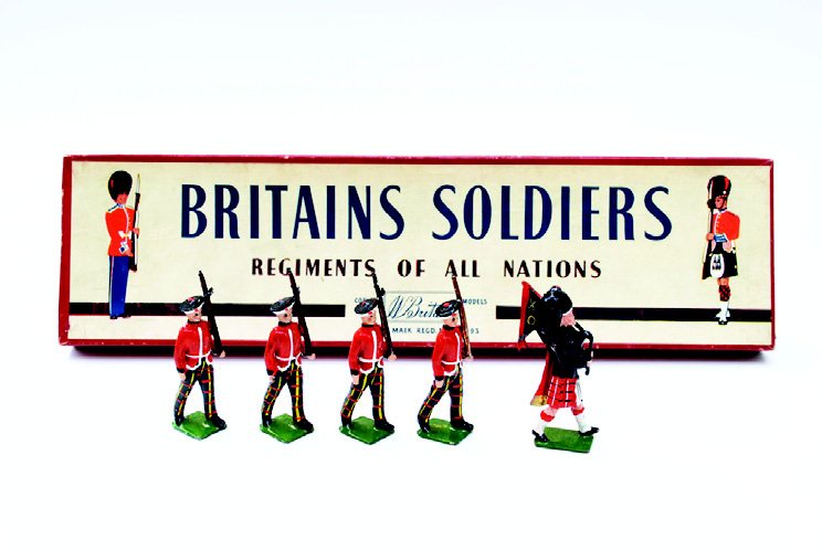 Britains Set #212 Royal Scots with Piper: Post War with Original Box, Untied. 5 Pieces. Condition Very Good, Box Very Good.