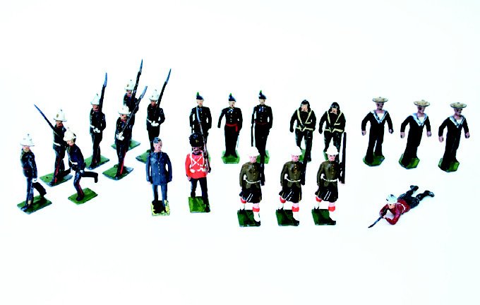 Britains Assortment: Royal Marines Marching and Running with Officer, Royal Airforce Pilots, Sailors in Straw Hat, Royal Irish Fusiliers at Attention, Airforce Officer, Cameron Highlanders, Royal Welch Fusiliers, and a Se