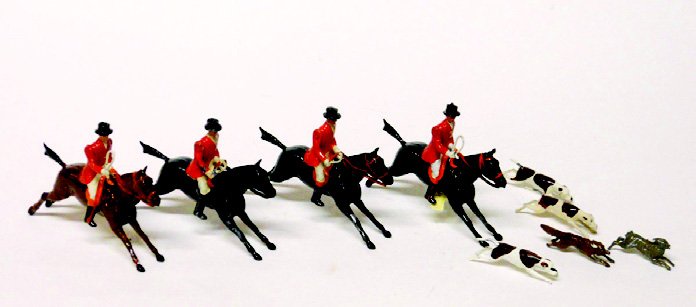 Britains Fox Hunt, Full Cry: 4 Mounted Hunstmen with Hounds, Fox and Hare. 9 Pieces. Unboxed. Condition Very Good.