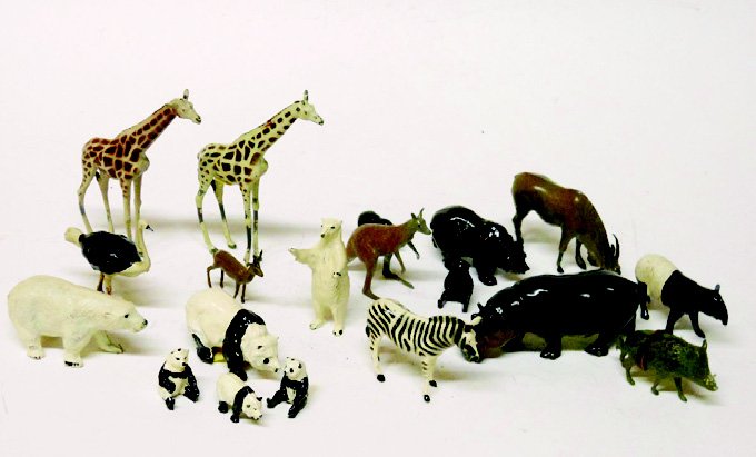 Britains Zoo Animals: Post War. Two Young Giraffes, a Young Hippopotamus, an Adult Panda and 3 Baby Pandas, Kangaroo, Tapir, Wart Hog, Brown Bear with 2 Cubs, Antelope, Zebra, Ostrich, Gazelle, Standing Polar Bear, and a P