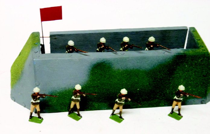 Britains Reproduction Exploding Trench: Homemade/Folk Art Reproduction of the rare Britains Exploding Trench, with Solid Cast Gloustershire Regiment Firing. 9 Pieces. Unboxed. Condition Excellent.