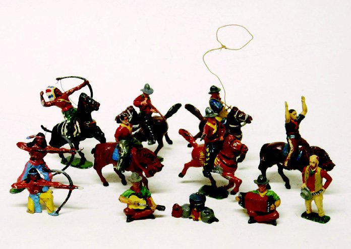 Timpo Cowboys and Indians: Post War. 5 Mounted Cowboys, One Mounted Indian, 2 Indian Braves, Cowboy Musicians with Campfire, and California from Hop-a-long Cassidy Series. 12 Pieces. Unboxed. Condition Excellent.