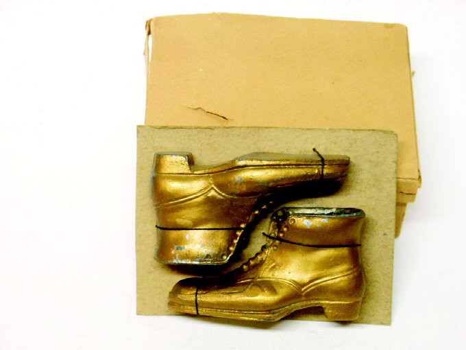 Manufacturer Unknown, Bronze Colored Boots: Pre-War Tied on Original Backing Card with Original Box. 2 Pieces. Condition Excellent.