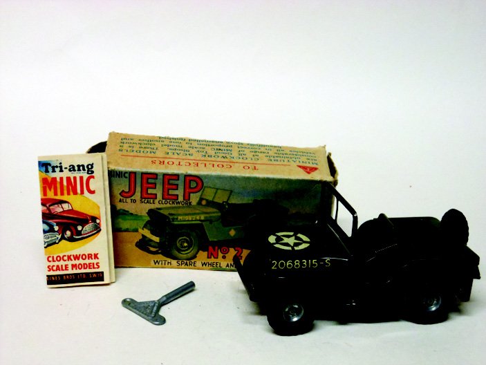 Tri-ang Minic U.S. Army Clockwork Jeep #2: Post War. With Original Box and Key. Condition Excellent and in working order (missing Jerry Can) Illustrated Box Good (one inner flap missing).