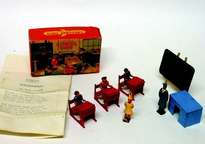 Crescent School Set #1227: Post War. With Original Illustrated Box. Male Teacher, Female Dunce, Blackboard and Easle, Teacher’s Desk, 3 Children Seated at Their Desks, a RARE Ink Well. And a Poem from Model Scholars. 11 Piece