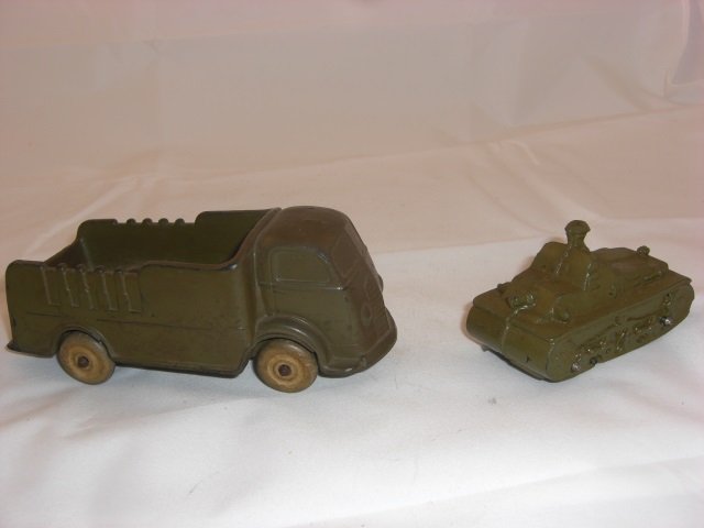Auburn Rubber Truck and Tank: Marmon-Harrington. Cab Over Stake Truck is 5 3/8 Inches long. Tank is 3 1/4 Inches long. 2 Pieces. Condition Excellent.