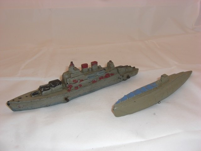 Auburn Rubber Battleship and Submarine: Circa 1940 and 1941. 8 1/4 Inches long and 6 Inches long. 2 Pieces. Condition Excellent.