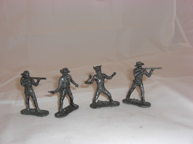 Metal Lone Star Figures: Rare Metal Figures. 2 3/8 Inches High. 4 Pieces. Condition Near Mint.