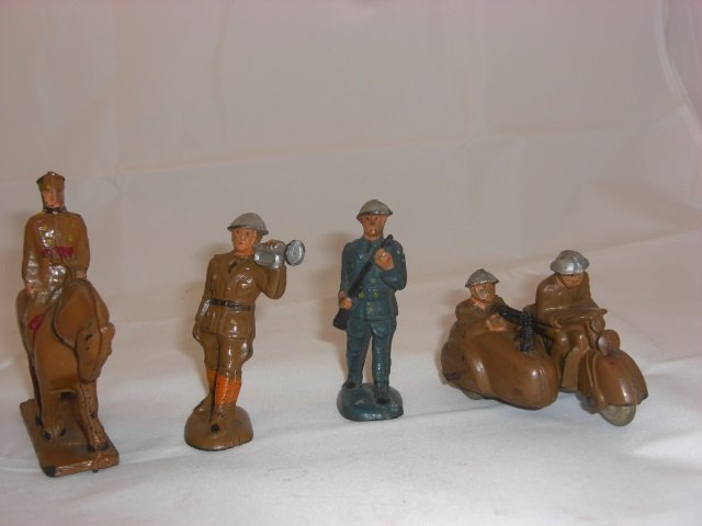 Auburn Rubber Military Pieces: Includes A12 Mounted Officer, A4 Bugler, A2A Private and A24 Motorcycle with Sidecar. 4 Pieces. Condition Excellent.