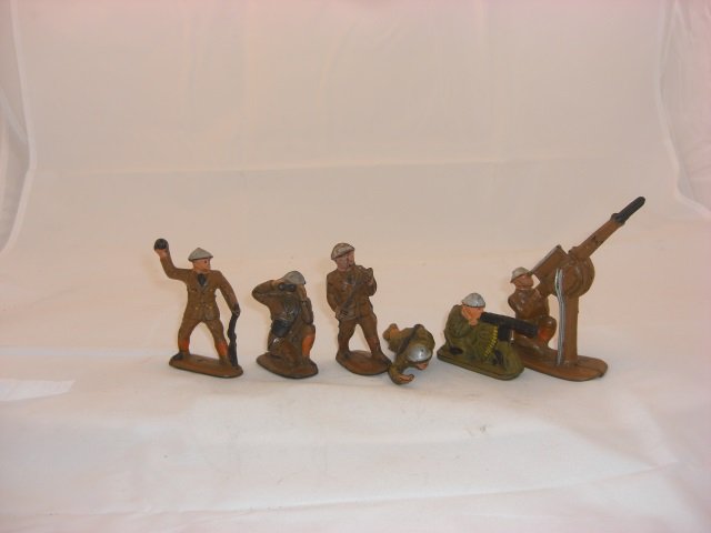 Auburn Rubber Military Pieces: Includes A2 Private, A13 Machine Gunner, A18 Observer with Binoculars, A20 Sniper Crawling, A21 Bomb Thrower and A22 Anti-Aircraft Gun. 6 Pieces. Condition Excellent.