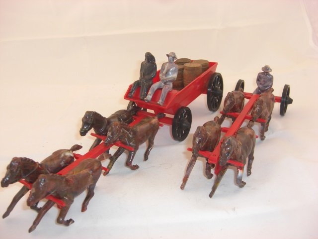 Plastic Horse Teams & Wagon: Includes 9 Inch Plastic Horse Team and Driver Sitting on Harness and 13 Inch Horse-Drawn Wagon with Barrels and Drivers. 2 Pieces. Condition Excellent.