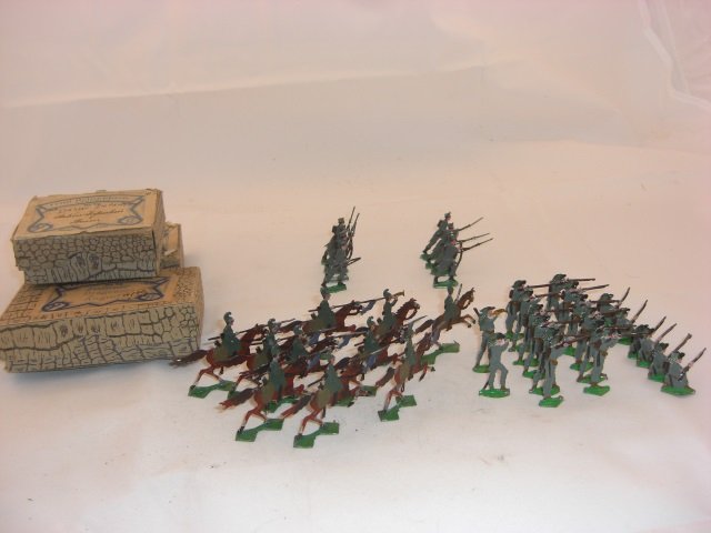 German Made Heirichsen Flats: In Original Boxes. 28 Italian Infantry and 10 Italian Cavalry. 38 Pieces. Condition Near Mint; With a couple broken rifles.
