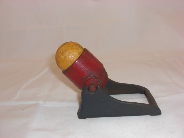 Kilgore Cast Iron Mortar: 5 Inches long and 3 1/2 Inches High. Rubber Ball Wilson. 1 Piece. Condition Excellent.
