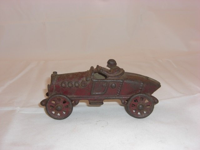 Cast Iron Racer: 5 1/2 Inches long. 1 Piece. Condition Good.