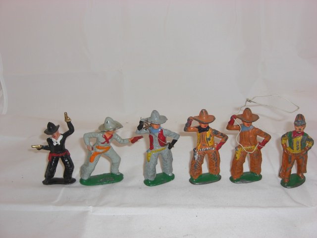 Barclay Cowboys: Includes B212A Cowboy with Gun Pointing in the Air, B96 Cowboy with Gun Pointing, 3 B95 Cowboy with Lasso and B94 Cowboy with Tin Hat. 6 Pieces. Condition Near Mint; 1 Lasso missing, 1 Lasso Broken an