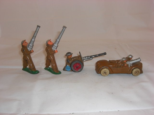 Barclay Artillery: Includes 2 B118 Anti-Aircraft Gunners, B145 Soldier Shooting Anti-Tank Gun and B153 Mobile Gunner and Driver. 4 Pieces. Condition Very Good.