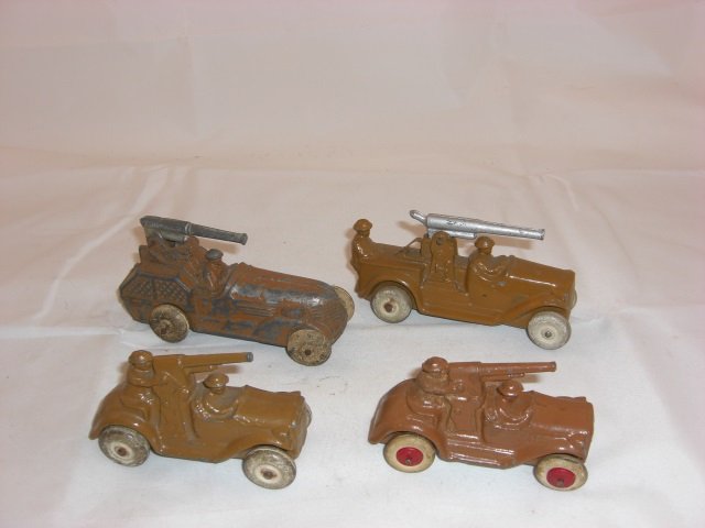 Barclay Vehicles: BV19 Anti-Aircraft Gun on Truck with 1 Man Measuring 4 Inches long, BV20 Anti-Aircraft Gun Truck with 2 Men Measuring 4 Inches Long and 2 BV18A Cannon Car Measuring 3 1/2 Inches long. All with Rubber