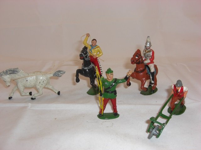 Timpo Figures: Mounted Lifeguard, Cowboy Lassoing Horse, Man Plowing and Ben Brother's Mutch the Miller's Son. 6 Pieces. Condition Excellent.